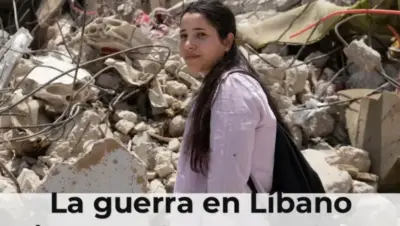 Mujer libanesa con hijo en zona de conflicto